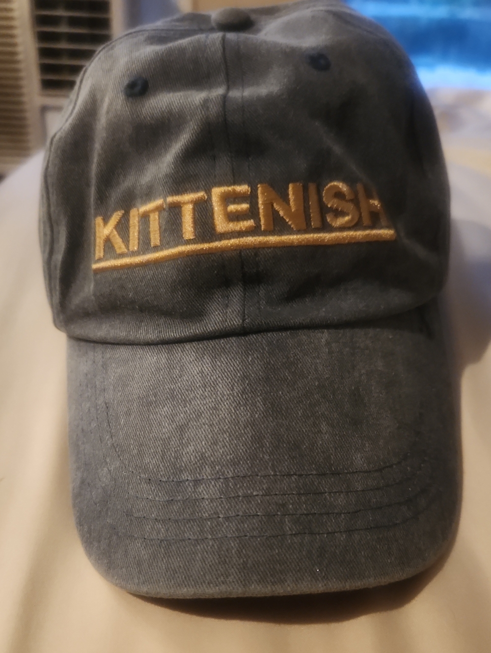 Kittenish Gray Baseball Cap with Gold Embroidered Logo